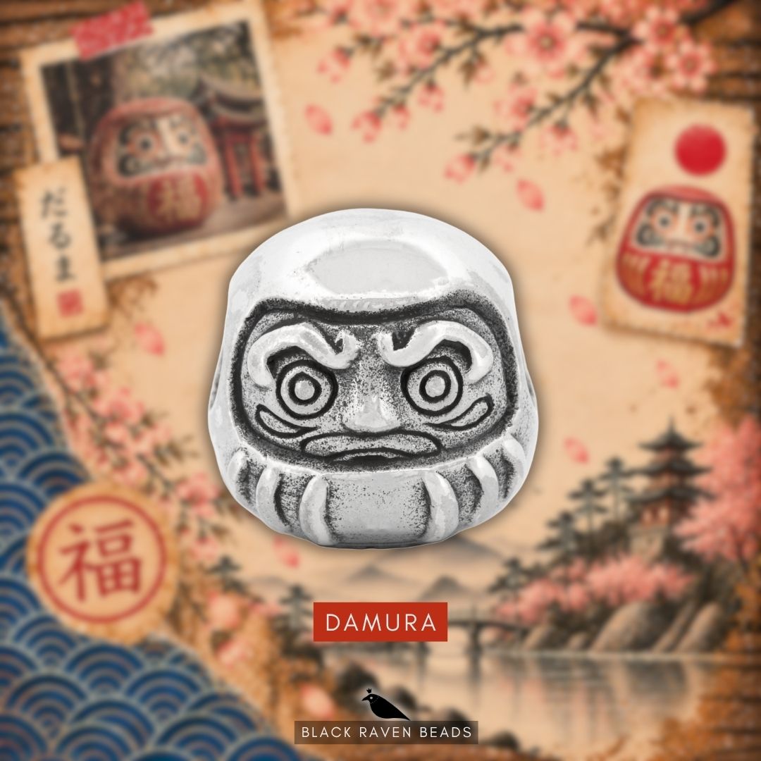 Black Raven Beads Daruma sterling silver bead displayed against a themed Japanese illustration background