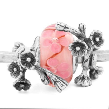 Two Sakura Branch sterling silver bead by Black Raven Beads showing its handcrafted cherry blossom details together with a Sakura glass bead